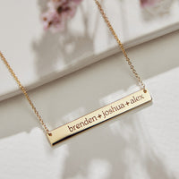 skinny bar necklace by tiny tags engraved with three names
