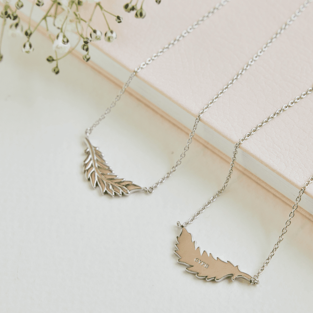 Floating Flamingo Feather Necklace by Lindsey Gurk