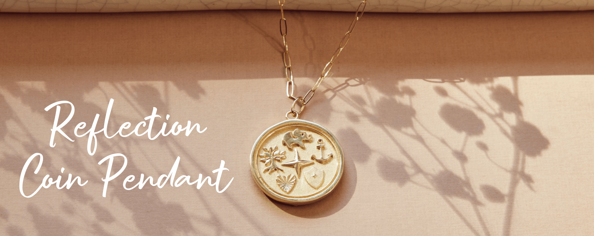 reflection coin pendant