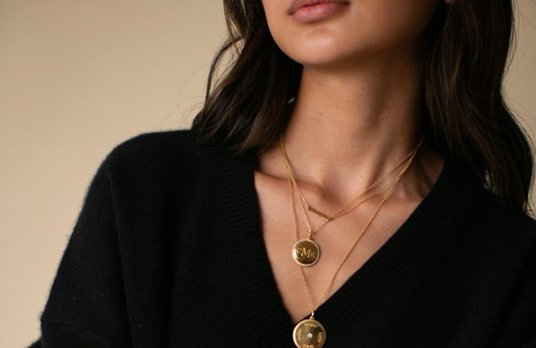 the one meryl streep wore! the circle pendant necklace is a classic. can hold up to 5 names and be engraved front and back.