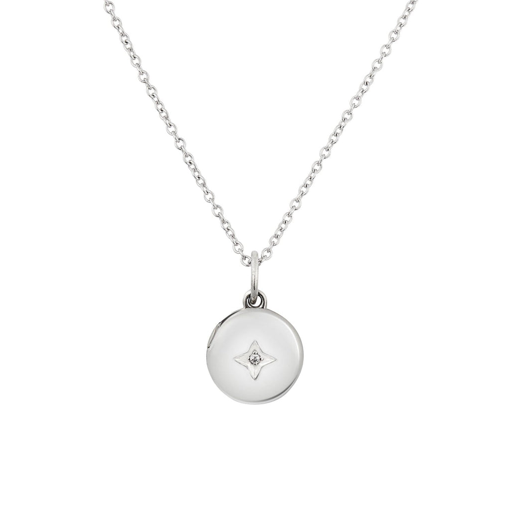 Sterling silver round mini locket necklace on white background