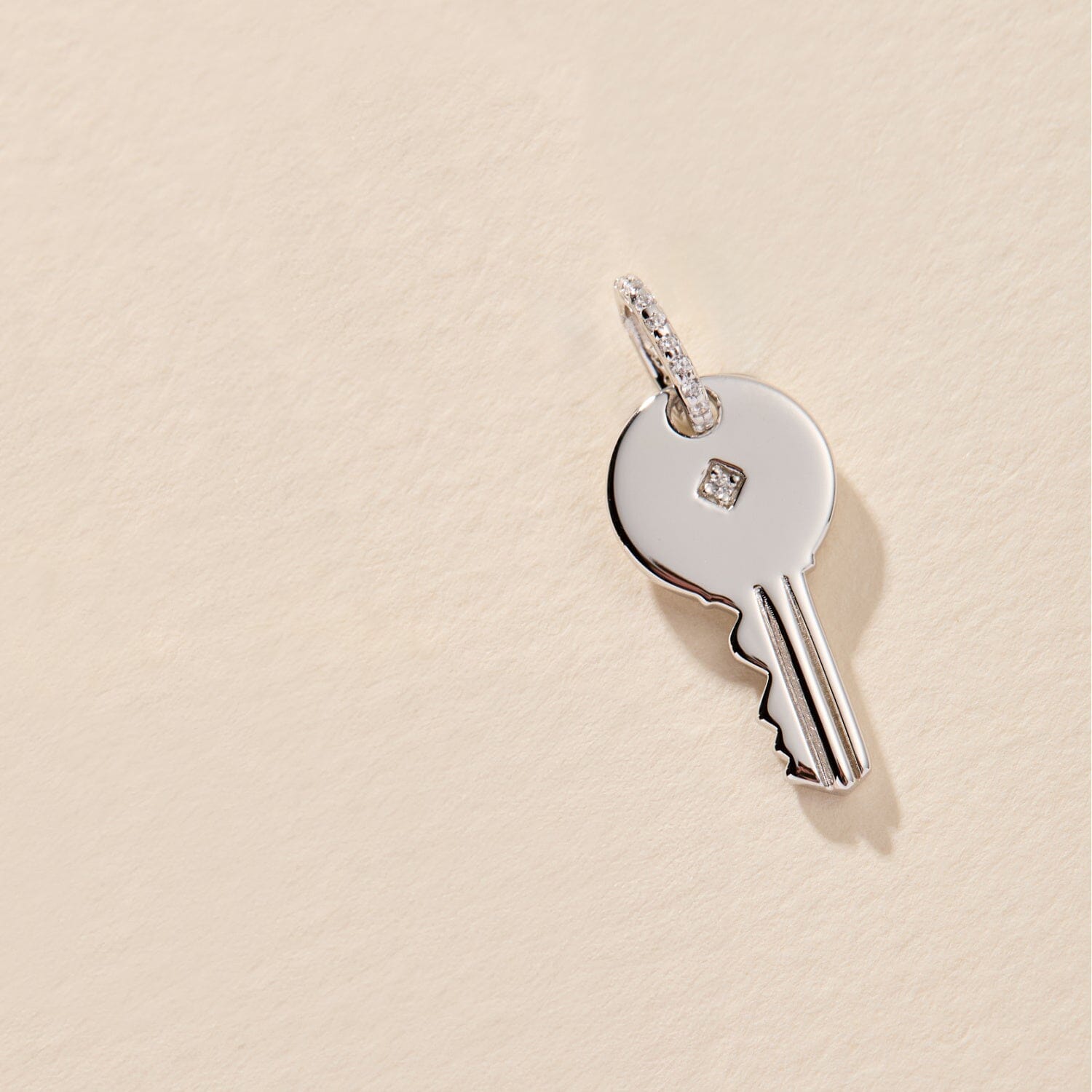 Round Key Charm With Stone