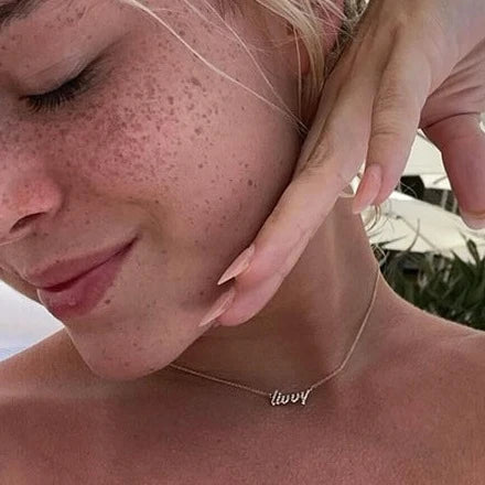 livvy dunne wearing 14k pave custom nameplate by tiny tags