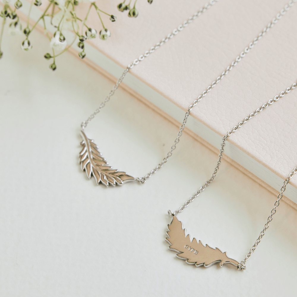 Floating Flamingo Feather Necklace by Lindsey Gurk